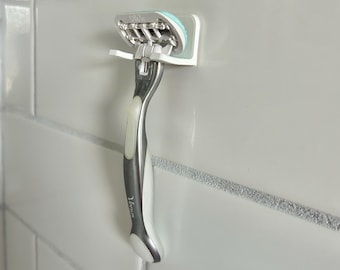 Soporte de pared para maquinillas de afeitar para organizar el baño y la ducha