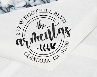 May include: A black self-inking stamp with the text "Stamp Out Est. 2001 www.stampoutonline.com" printed on it. The stamp is on a white envelope with a black and white circular stamp that reads "337 W Foothill Blvd the armentas Glendora CA 91740".