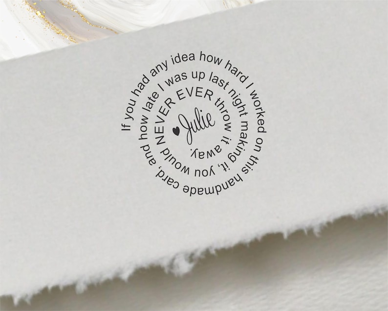 May include: A white handmade card with a circular black text design. The text reads "If you had any idea how hard I worked on this handmade card, and how late I was up last night making it, you would NEVER throw it away." The name "Julie" is in the center.