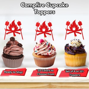 May include: Three cupcakes with red glitter campfire toppers. The cupcakes have different frosting and toppings. The text "Campfire Cupcake Toppers" is at the top. The text "Ready to Ship!", "10 Colors to Choose From", and "Set of 6 or 12+ Toppers" are at the bottom.