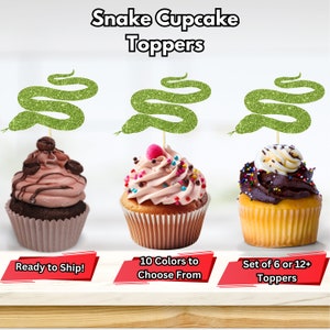 May include: Three cupcakes with green glitter snake toppers. The cupcakes have different frosting and toppings. Text on the image reads "Snake Cupcake Toppers", "Ready to Ship!", "10 Colors to Choose From", and "Set of 6 or 12+ Toppers".