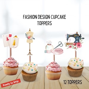 May include: Cupcakes with pink and white frosting, topped with colorful sprinkles. Each cupcake has a fashion-themed topper, including a dress form, sewing machine, and fashion sketches. The text "Fashion Design Cupcake Toppers" is displayed above the cupcakes.