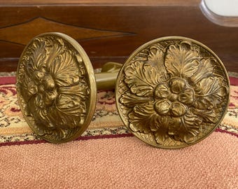Vintage pair of brass circle curtain tie backs