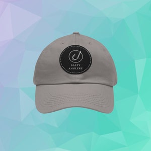 Salty Anglerz-logotyp, fiskehatt, basebollkeps, lädermärke, böjd näbb