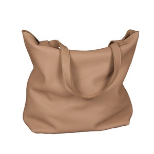 May include: A light brown leather tote bag with two shoulder straps.