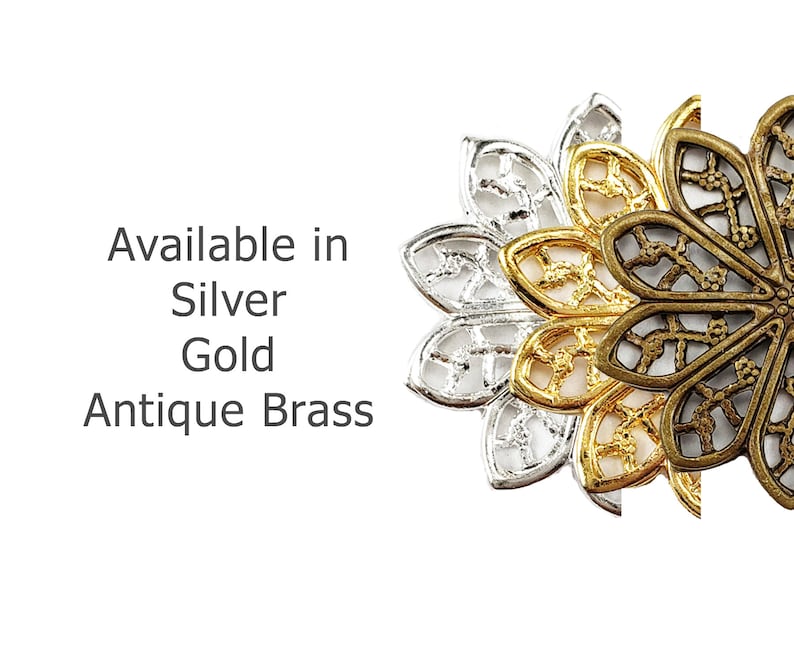 May include: Three decorative metal flower-shaped charms in silver, gold, and antique brass. Available in Silver, Gold, Antique Brass.