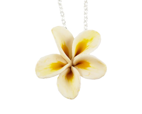 Gold plumeria best sale pendant