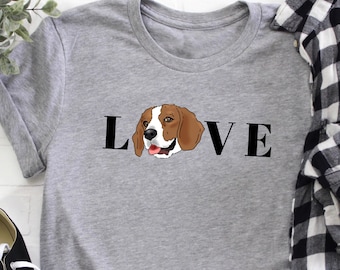 May include: Grey t-shirt with the word "LOVE" printed in black, with a beagle dog illustration replacing the "O".