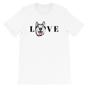 May include: White t-shirt with a black husky dog illustration and the word "LOVE" printed on it.