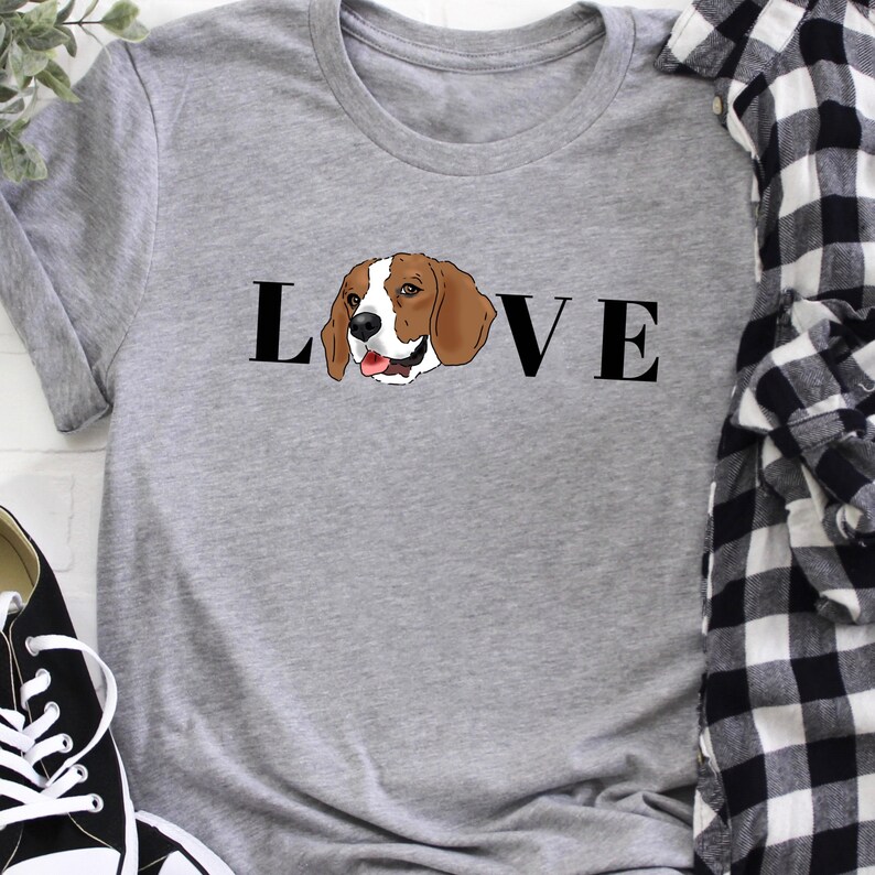 May include: Grey t-shirt with the word "LOVE" printed in black, with a beagle dog illustration replacing the "O".
