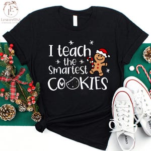 I Teach The Smartest Cookies Vintage Gingerbread Teacher T-Shirt I Teach The Smartest Cookies Vintage Gingerbread Teacher T-Shirt