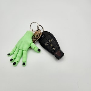 Glühen im dunklen Zombie Hand Schlüsselanhänger