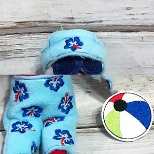 May include: A light blue doll outfit with embroidered blue and red hibiscus flowers. The outfit includes a hat, sunglasses, and shorts. A colorful beach ball patch is also included.