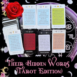 May include: A tarot deck with cards featuring romantic and introspective messages. The deck includes cards like "Knight of Cups" and "The Devil," with a red rose and the text "Their Hidden Words Tarot Edition."