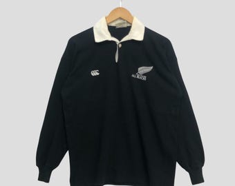 Polo vintage negro de Canterbury de Nueva Zelanda, años 90, Rugby All Blacks Steinlager Polo Rugby, camiseta con logotipo bordado Joanah Lomu, talla XL