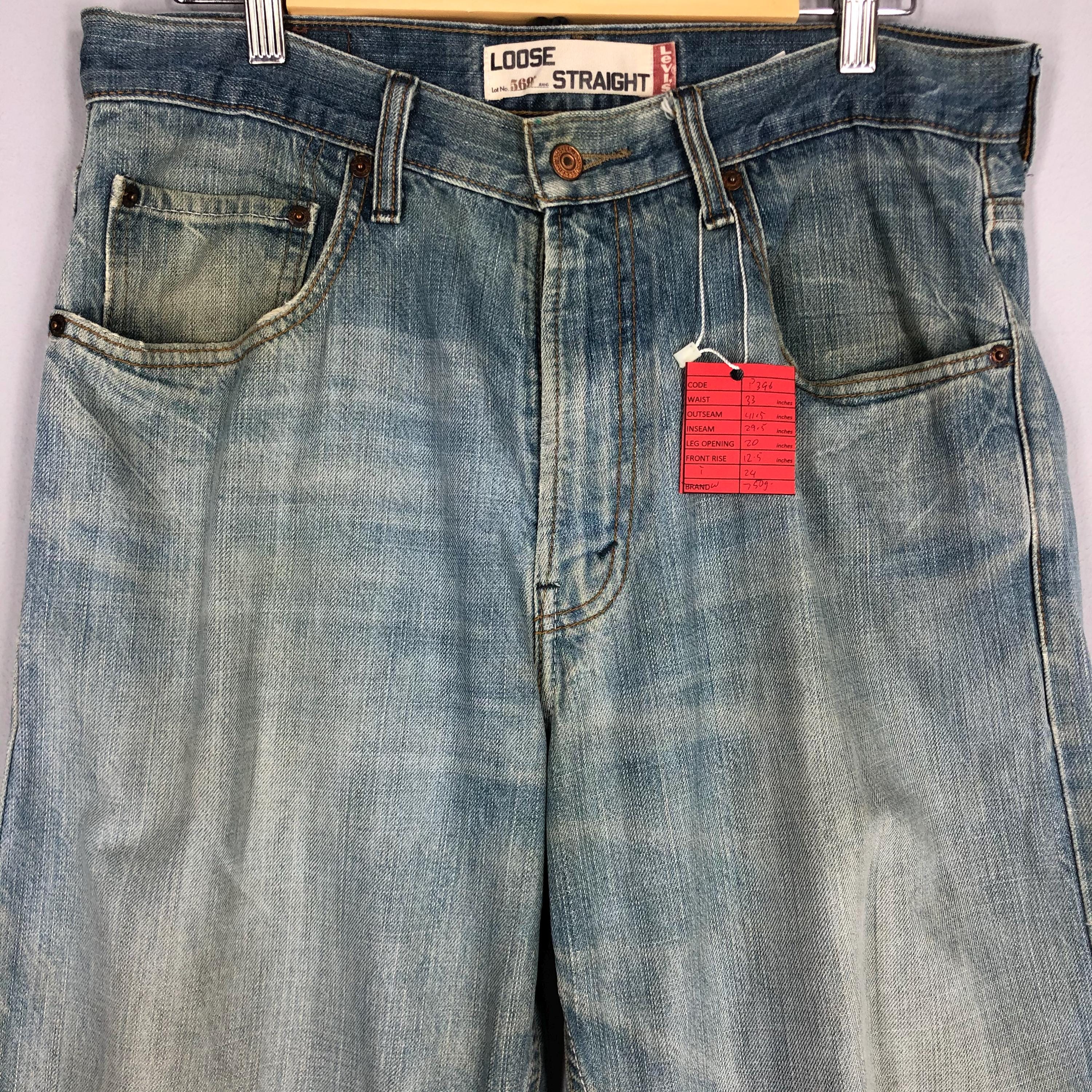 Vintage Levi's 569 Jeans: 90s Light Blue Stone Washed Ripped Denim