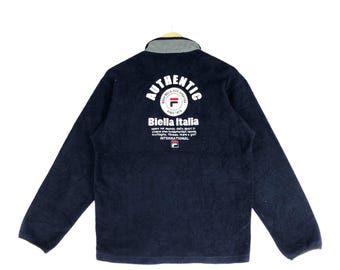 Suéter polar Fila vintage de los 90, con media cremallera, talla M