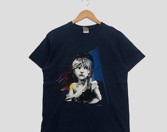 Vintage Y2K Les Misérables Graphic T-Shirt Fruit of The Loom Streetwear Retro Style Made In USA Play T-Shirt Blue Size M