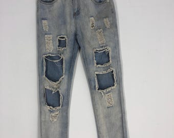 Jean déchiré patchwork vintage, denim délavé effet vieilli (27 x 37)