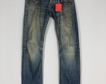 Jean délavé effet vieilli, denim déchiré, taille 31 x 40