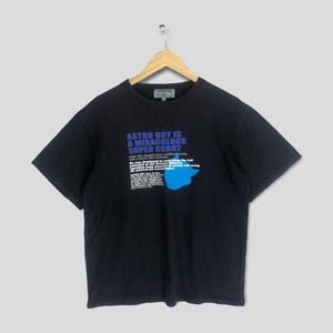 ヴィンテージ 鉄腕アトム マイティアトム 日本のアニメ Tシャツ ミディアム マンガ アキラ 鉄腕アトム 手塚治虫 鉄腕アトム アニマ ロボット リンガー Tシャツ サイズ L