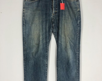Vaqueros Wrangler vintage 38x44, denim lavado a la piedra, desgastados