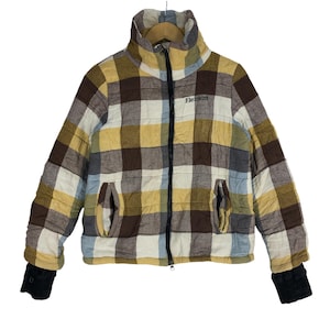 May include: A brown, yellow and white plaid puffer jacket with a zip fastening and a black "Element" logo on the front.
