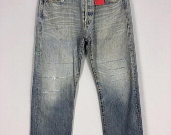 Vintage 80s Levi's 501 Jeans: Ripped Denim, Made in USA (W32 L32.5