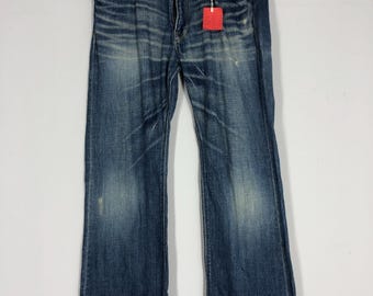 Vintage Stone Washed Jeans 34x39: Faded Distressed Ripped Denim