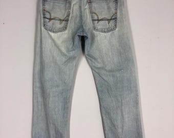 Vintage Edwin 505 Stone Washed Jeans: Distressed Ripped Denim, 34x44