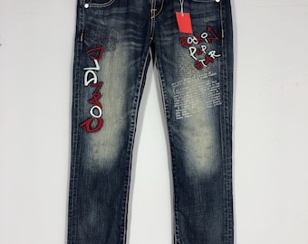 Embroidered Low Rise Distressed Jeans: Stone Washed Ripped Denim