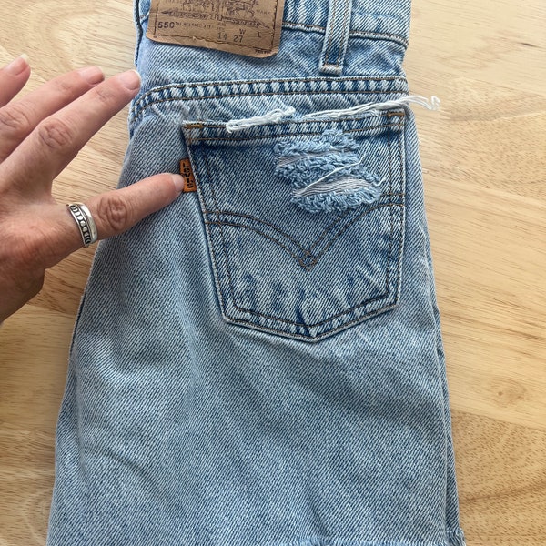 Vintage orange tab Levi distressed cut off denim jean shorts tagged girls 14