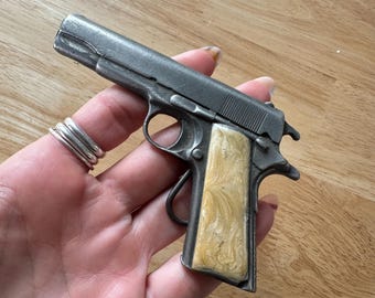 Fivela de cinto de arma vintage dos anos 70