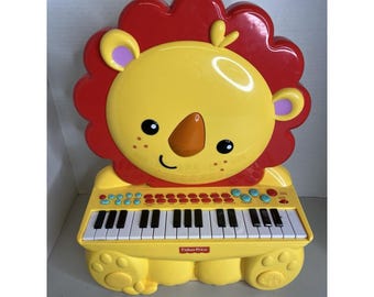 Pianino Fisher Price dla malucha, lew, 32 klawisze, dźwięki zwierząt