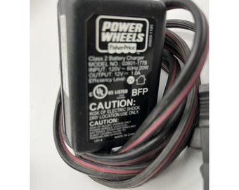 00801-1778 - Cargador de batería Power Wheels de 12 V, color gris+