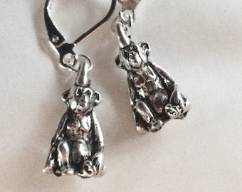 Cheeky monkey silver tone earrings for pierced ears