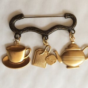 Time for Tea Cup of Tea charm bronze and gold tone brooch / pin Teapot, tea cup and tea bag charms