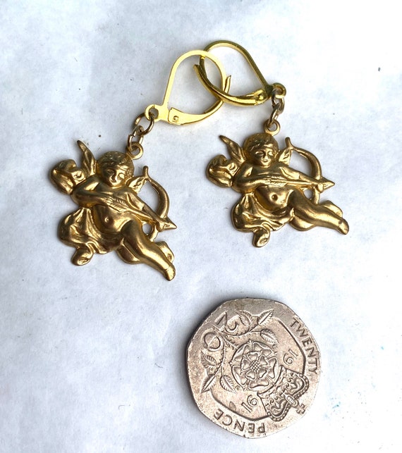 Cherub earrings best sale