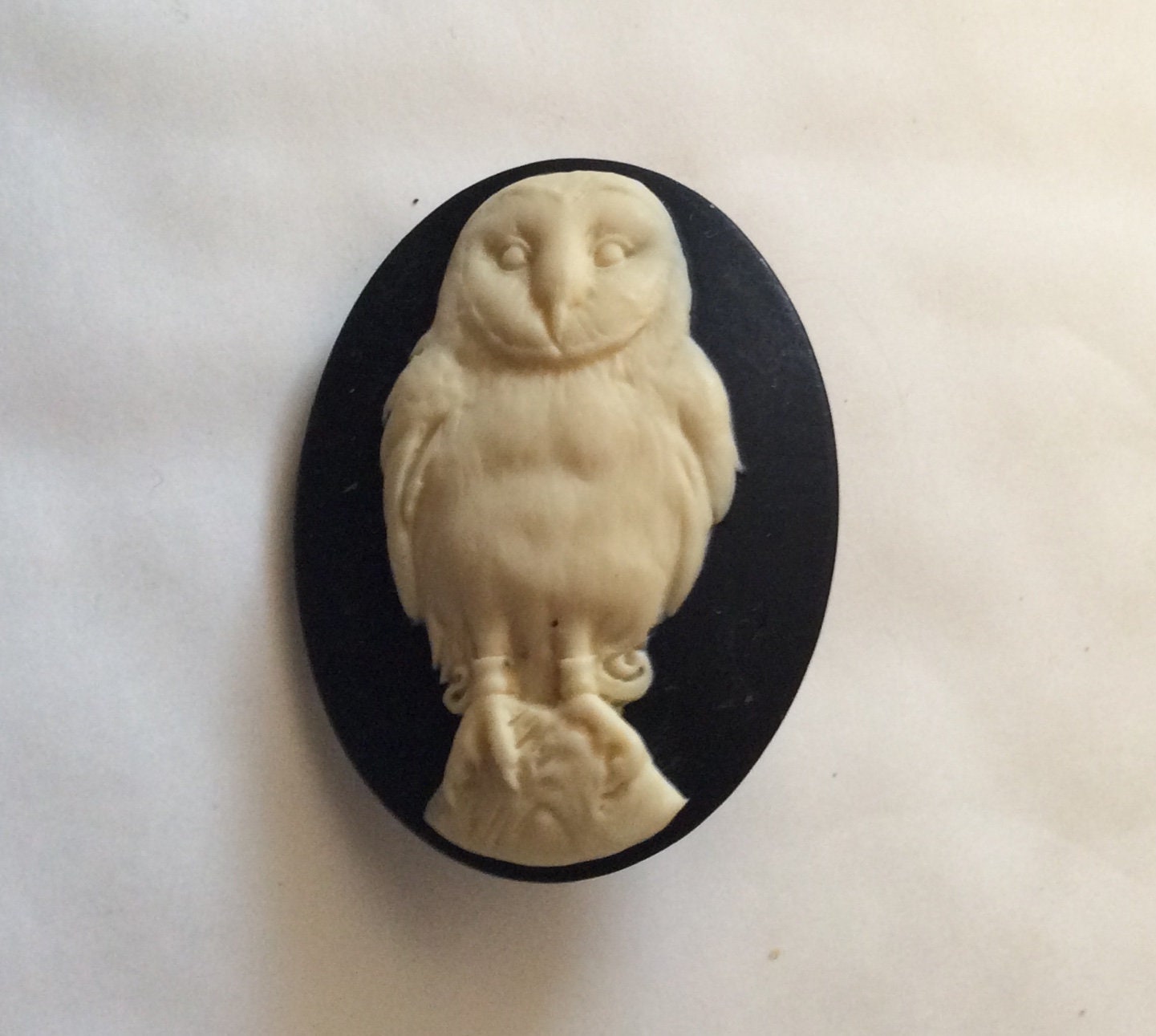 Owl resin cameo black and cream bird brooch