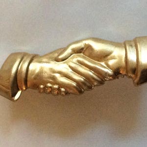 Two hand shaking elegant hand small brooch pin friendship pin created from vintage raw brass finding