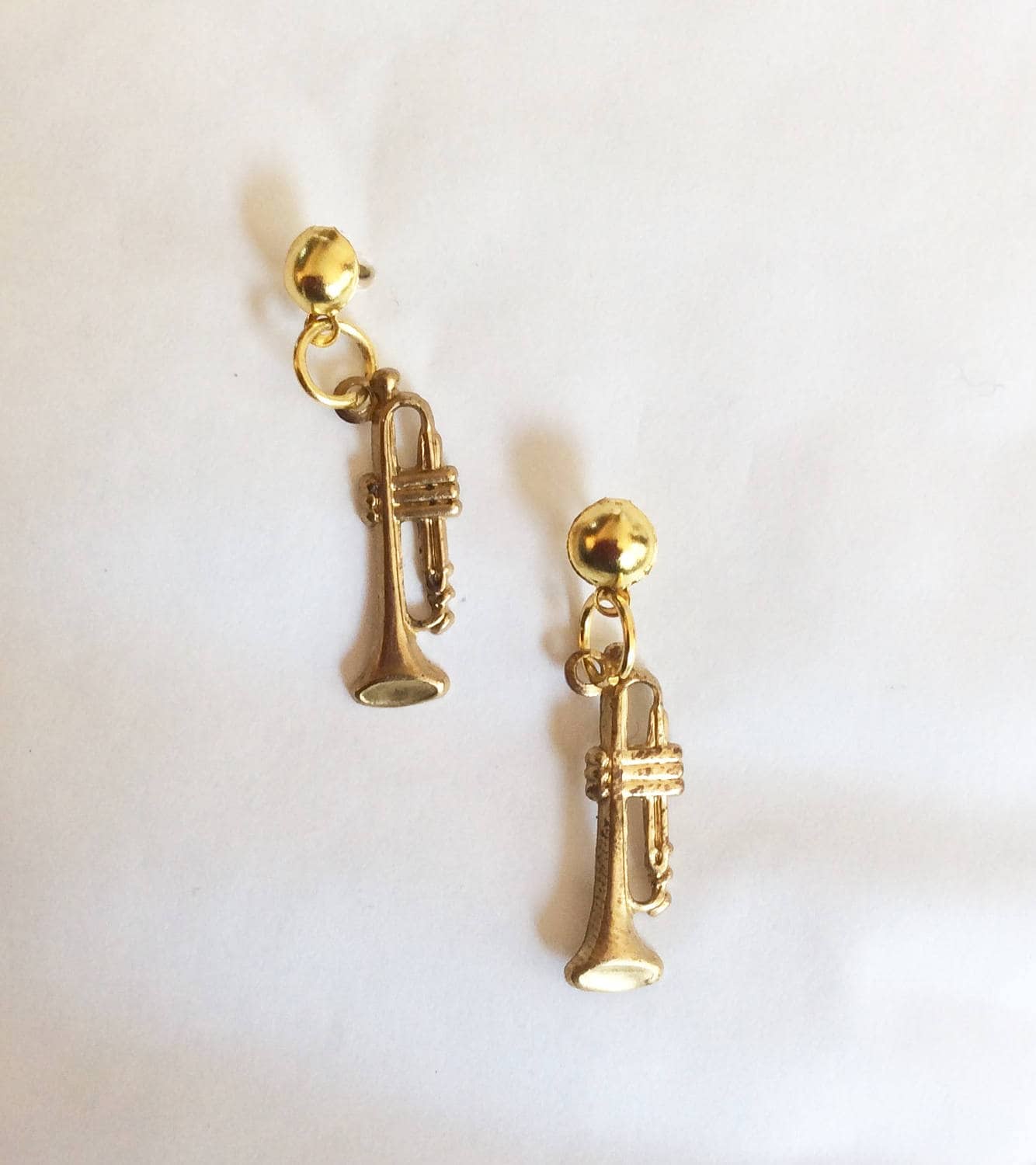 Trumpet earrings deals