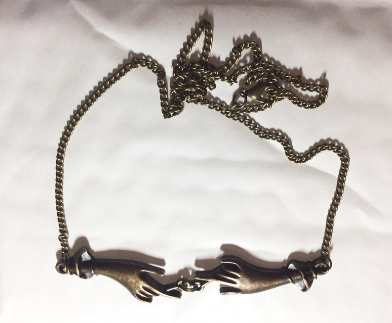 Pair of hands necklace Two hand necklace bronze tone charms 56cm chain