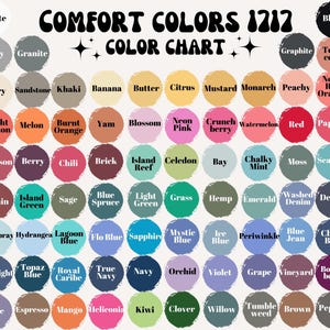 Comfort Colors 1717 Color Chart displaying a wide variety of t-shirt color options. Each color is represented by a circular swatch with a labeled name in bold text. The chart includes neutral shades like White, Black, Gray, and Sandstone, as well as vibrant options like Neon Pink, Bright Salmon, and Lagoon Blue. Earthy tones such as Sage, Hemp, and Terra Cotta are also available.