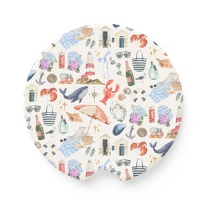 May include: A round coaster with a white background and a colorful pattern of beach-themed illustrations. The pattern includes seashells, lighthouses, anchors, lobsters, beach umbrellas, and more.