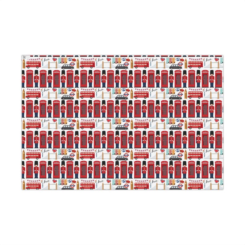 May include: Three rolls of London-themed wrapping paper feature red telephone booths, guards, buses, and crowns on a white background.  The text 'London' is visible on one roll.  The paper is ideal for gift-wrapping and showcases a classic British design aesthetic.