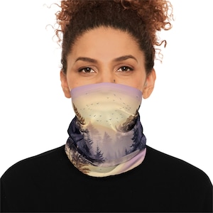 May include: A purple, yellow, and blue patterned face mask with a forest scene and birds flying in the sky.