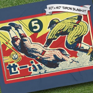 May include: A 50" x 60" throw blanket featuring a vintage illustration of two baseball players in action. The illustration is in a comic book style with bold colors and a red, yellow, and blue color scheme. The text "5" and "セーバー" are visible in the image.