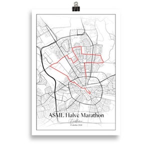 May include: A black and white map of the ASML Halve Marathon in Eindhoven, Netherlands, with the race route highlighted in red. The race is scheduled for 11 October 2024.