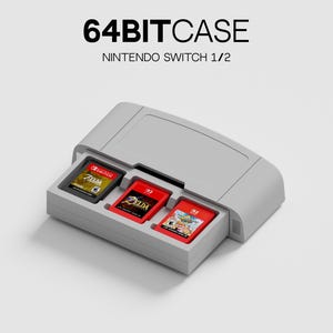 May include: A light gray plastic storage case shaped like a vintage game cartridge, featuring three slots containing Nintendo Switch game cards. The text 64BITCASE and NINTENDO SWITCH 1/2 is printed above the case in a clean, black sans-serif font.
