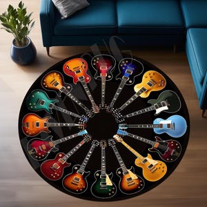 May include: A round rug with a black background features a circular design of 16 electric guitars in various colors, including red, blue, green, yellow, and black. The guitars are arranged in a circle around the center of the rug.